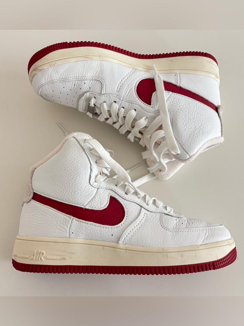 Nike “Dunk High” White and Red High-Top Sneakers